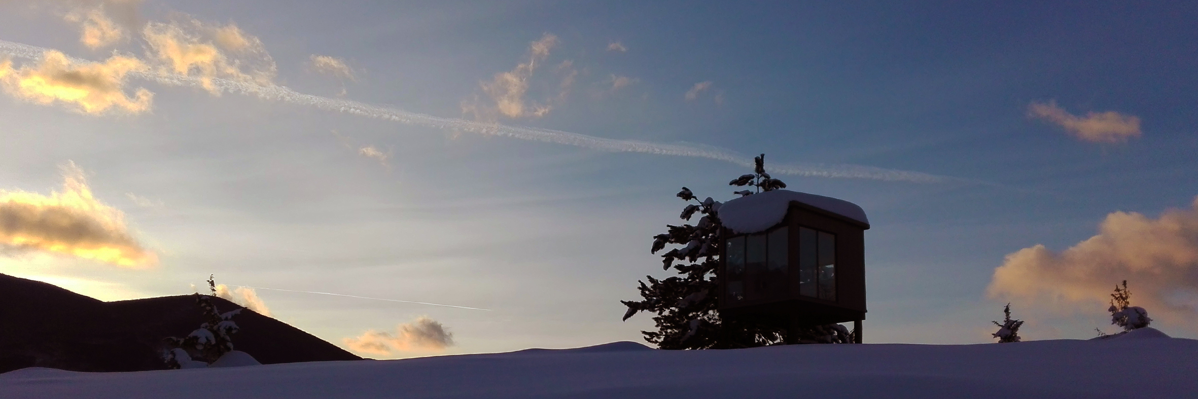 neve al PineCube durante ciaspolata al tramonto